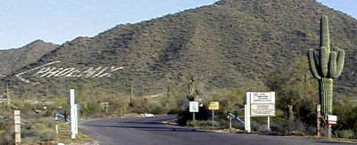 THE FAMOUS PHOENIX SIGN AND ARROW ON THE SIDE OF SUPERSTITION MOUNTAINS