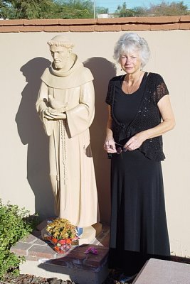 SARA WAS DRESSED TO THE NINES-SHE LOOKED LOVELY AND EVEN ST.  FRANCIS THOUGHT SO....