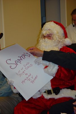 SANTA READ A LIST OF WHO IN THE PARK WAS NAUGHTY AND WHO WAS NICE-DON WAS NICE, SARA NAUGHTY......