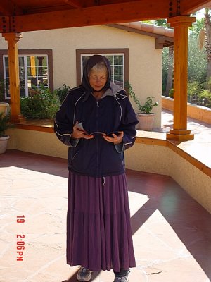 SISTER SARA HAD TO BE PROPERLY GARBED TO TOUR THE MONASTERY..........