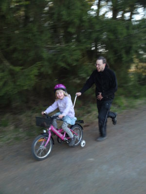 My niece learning to ride the bike