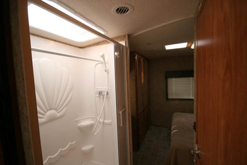 Hall of our RV (Shower on the left, bathroom on the right, bedroom at the back)