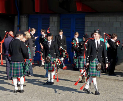 Young Bagpipers Preparing to Play for Departure from Invergordon, Scotland