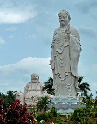 'Future (Fat) Buddha' & 'Past (Tall) Buddha' at  Vinh Trang Pagoda