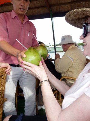Qua (Tour Guide) Provides Fresh Coconut Juice