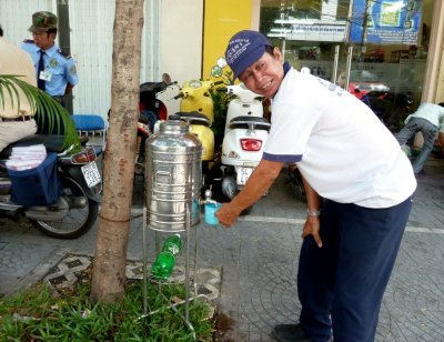 Water Break for Bill's Pedicab Driver