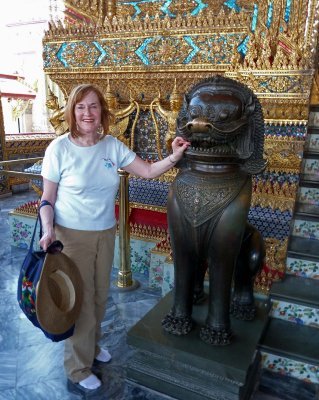 An Offering to the Temple Guard Before Entering the Emerald Buddha Temple