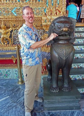 An Offering to the Temple Guard Before Entering the Emerald Buddha Temple