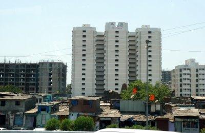 Shantytown in Front of Modern High Rise in Bombay (Mumbai), India