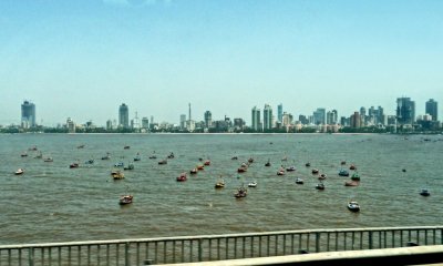 Fishing Boats in Mahim Bay with South Bombay Skyline in the Background