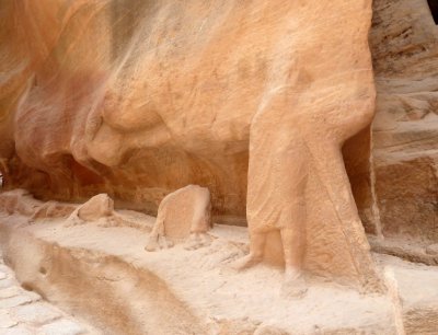 Remains of Carving of a Man Leading Camels