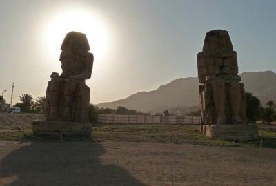 The Colossi of Memnon (1350 BC) as the Sun Sets