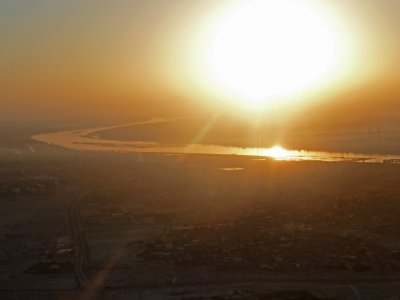 Blazing Sun & Fog Over the Nile River