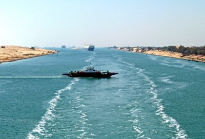 Ferry Crossing Between Ships in Suez Canal
