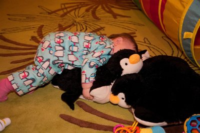 Amelia and her soft penguin pillow