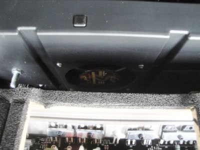 Cooling fans mounted on the opposite side of the compartment baffle