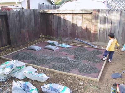 Starting the gravel; my little helper too!