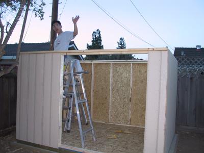 Installing the doublers, waving to my wife.