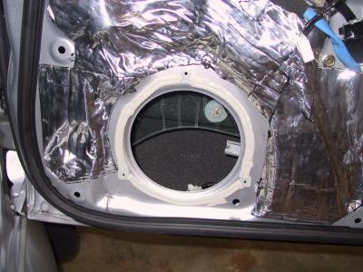 Cord weatherstrip installed on door panel.