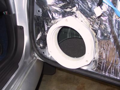 Spacer installed.  Note it has been primed for weatherproofing. More caulk placed around the inner edge too.