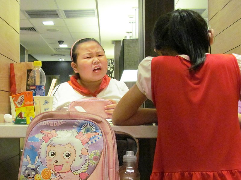 School-friends doing their homework in a McDonalds on Xinzha Road