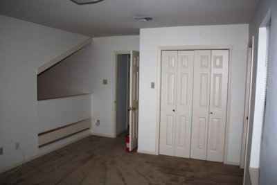 Upstars Bedroom with loft over dining area