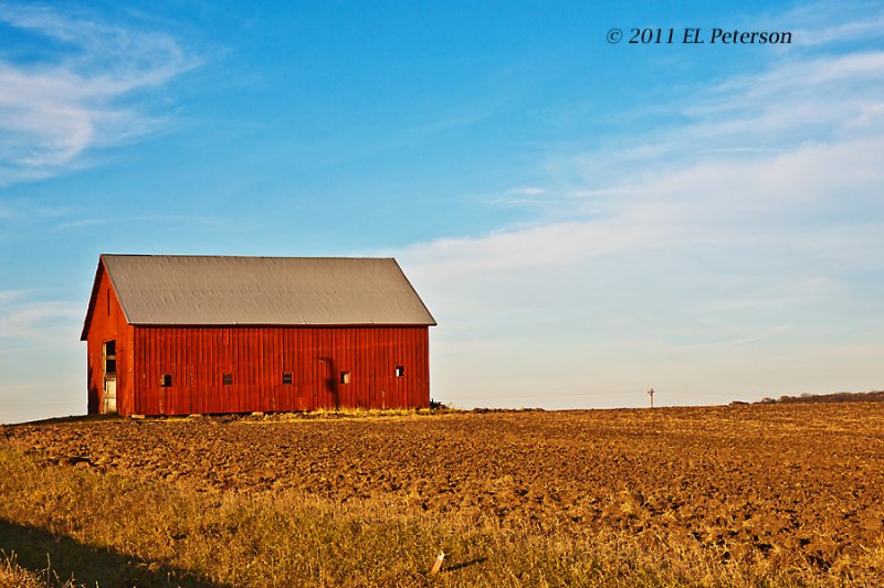 Some barns really stand out when the crops have been harvested.
An image of this print can be purchased at http://edward-peterson.artistwebsites.com/featured/harvest-is-in-edward-peterson.html