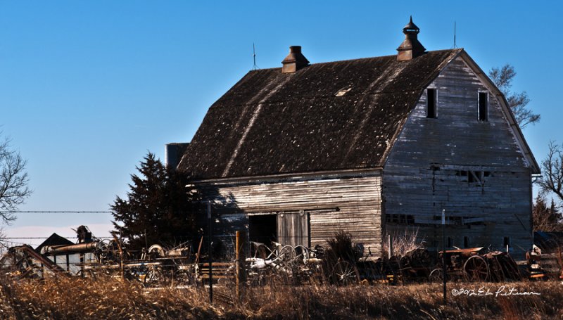 There is a whole lot to look at both in and out of the barn. A real history area.
An image may be purchased at http://fineartamerica.com/featured/history-with-a-barn-edward-peterson.html