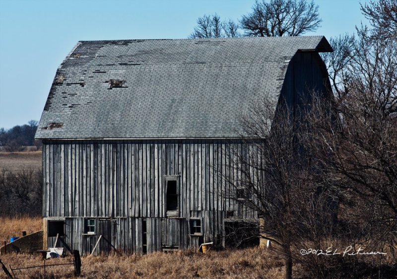 A pretty standard run of the mill old barn. So much has happened and been stored in these buildings.
An image may be purchased at http://edward-peterson.artistwebsites.com/featured/simple-barn-edward-peterson.html