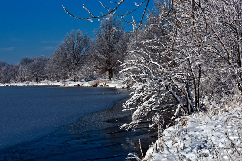 There were only two colors on this day, blue and white.
An image may be purchased at http://edward-peterson.artistwebsites.com/featured/lake-edge-edward-peterson.html