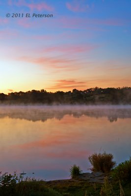 The sun is coming up, the mist is coming off the water and house lights are coming on.  Great beginning.