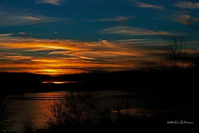 Sky, light and ice produce some great sunsets.
An image may be purchased at http://edward-peterson.artistwebsites.com/featured/blue-sky-sunset-edward-peterson.html