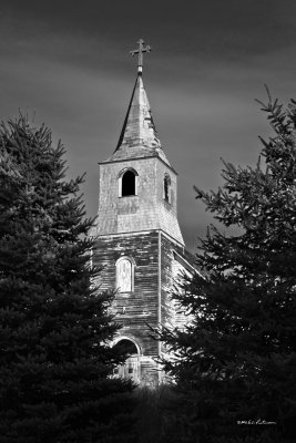 Back in the days when this church was built only black and white photos could be had.
An image may be purchased at http://fineartamerica.com/featured/country-church-in-bw-edward-peterson.html