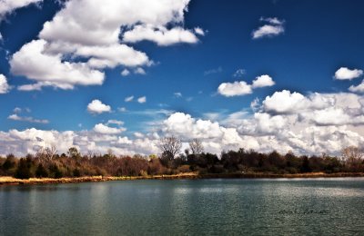 A spring day, blue skies and white fluffy clouds. Doesn't get much better.
An image may be purchased at http://edward-peterson.artistwebsites.com/featured/spring-clouds-edward-peterson.html
