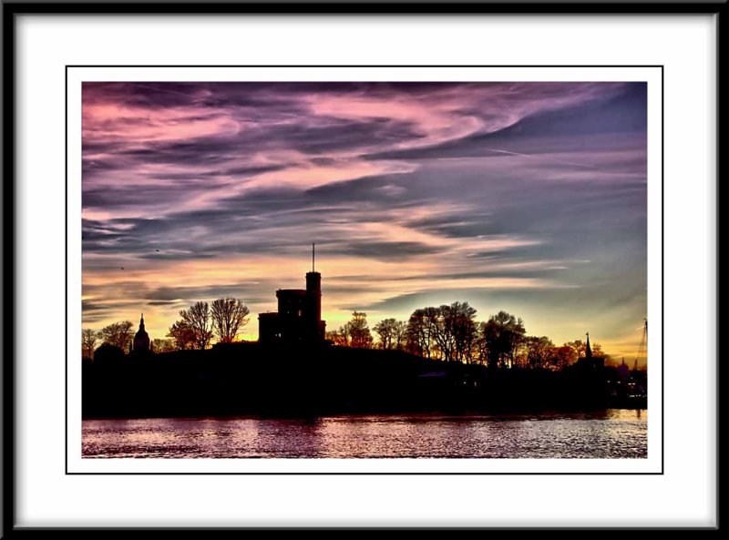 the little castle bathed in gorgeous colors at sundown...