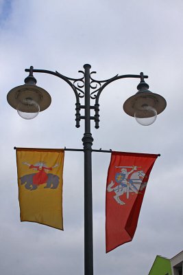 Lantern and coats of arms on the flags
