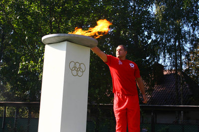 Rafal Kubacki lights the Olympic fire in Biskupin