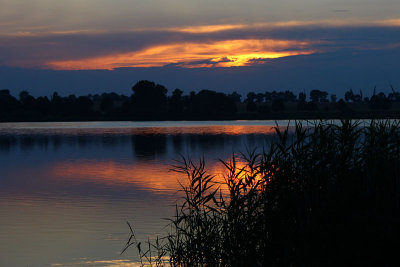 Summer sunset at Biskupin's lake