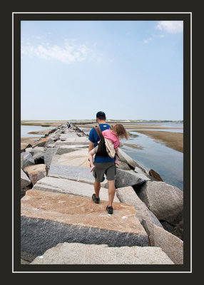 Walking back on the breakwater