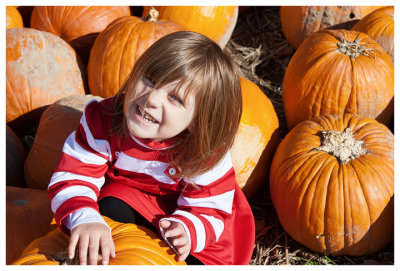 Norah picks a pumpkin