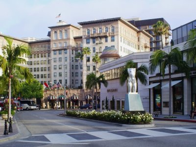 Modern art at trendy Rodeo Drive intersection with Wilshire Blvd in the background