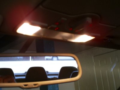 VW Passat W8 4Motion 6MT with VW OEM sunshade in rear view mirror