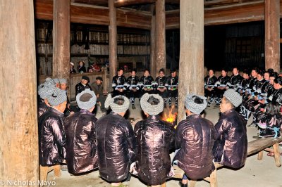 China (Guizhou) - Da Ge Groups Around Fire In Drum Tower