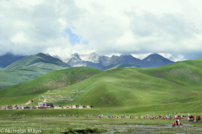 China (Sichuan) - Opening Festival Ride Past Monastery