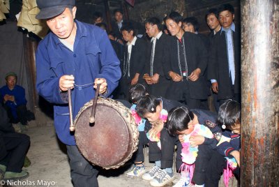 China (Yunnan) - Beating The Frame Drum At Dujie
