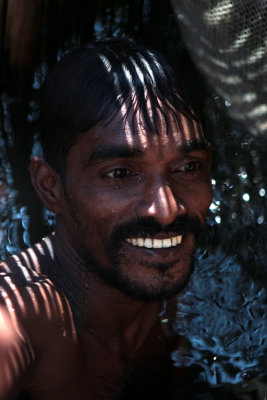 Prawn fisherman, Madu Ganga wetland