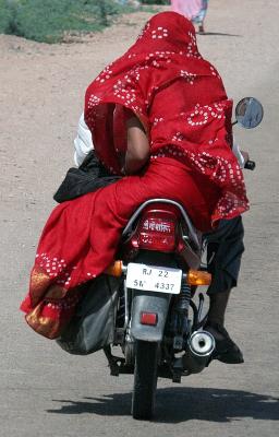 Common transport, the bikes have 'sari guards'