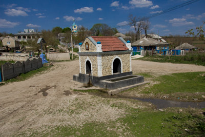 Moldova village, wellhouse infront