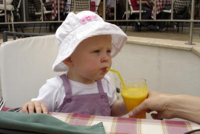 Lady enjoying fresh orange juice