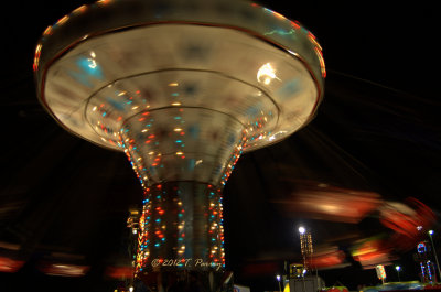 a glimpse of a carnival at night